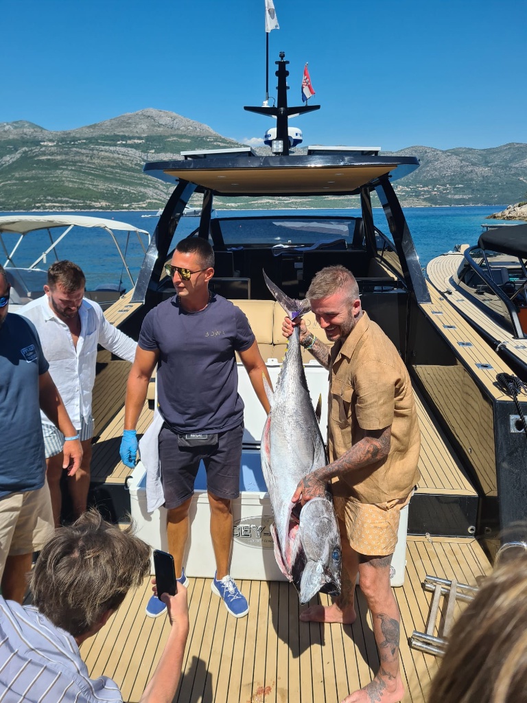 A moment aboard a boat — the photo everyone sees